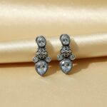 filigree earring and light colored cubic zirconia stones.
